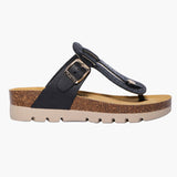 Black sandal with cork sole on a white background
