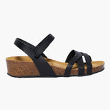 Black sandal with cork sole on a white background