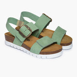 A pair of Plakton Condor platform bio-sandals in mint, showcasing the double-strap design with oversized buckles and an elevated ergonomic footbed designed for sustainable summer style.