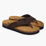 Side profile of a brown Plakton Acide thong sandal, showcasing the thick sustainable cork midsole, the matte brown nobuck leather straps, and a black serrated rubber sole for superior grip.