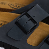 Detailed view of the adjustable buckle on the Plakton Barna grey sandal with soft leather upper and cork footbed.
