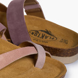An extreme close-up of the Bloom’s upper, focusing on the rich, fibrous texture of the Multi-Pink suede. The shot highlights the delicate tonal stitching where the pink layers meet, while the soft-focus background shows the porous Spanish cork, reinforcing its premium handcrafted Mediterranean heritage.