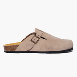 A Gray suede clog shoe with a buckle-up closure, adjustable strap a flat cork insole and EVA outsole. Handmade in Spain