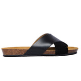 A black leather sandal with a cork sole, handmade in Spain.