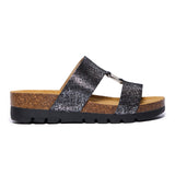 Pewter Crinkle Plakton Clarissa sandal with two wide leather straps connected by a gold metal detail, cork and Memory Foam footbed, and a white lightweight sole.