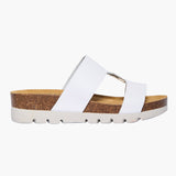 White sandal with cork sole on a white background