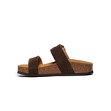 Brown sandal with cork sole on a white background